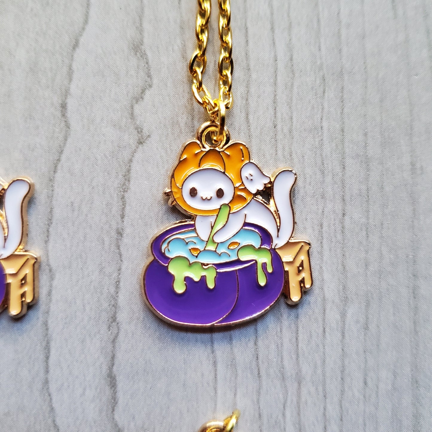 Cauldron Kitty Necklaces