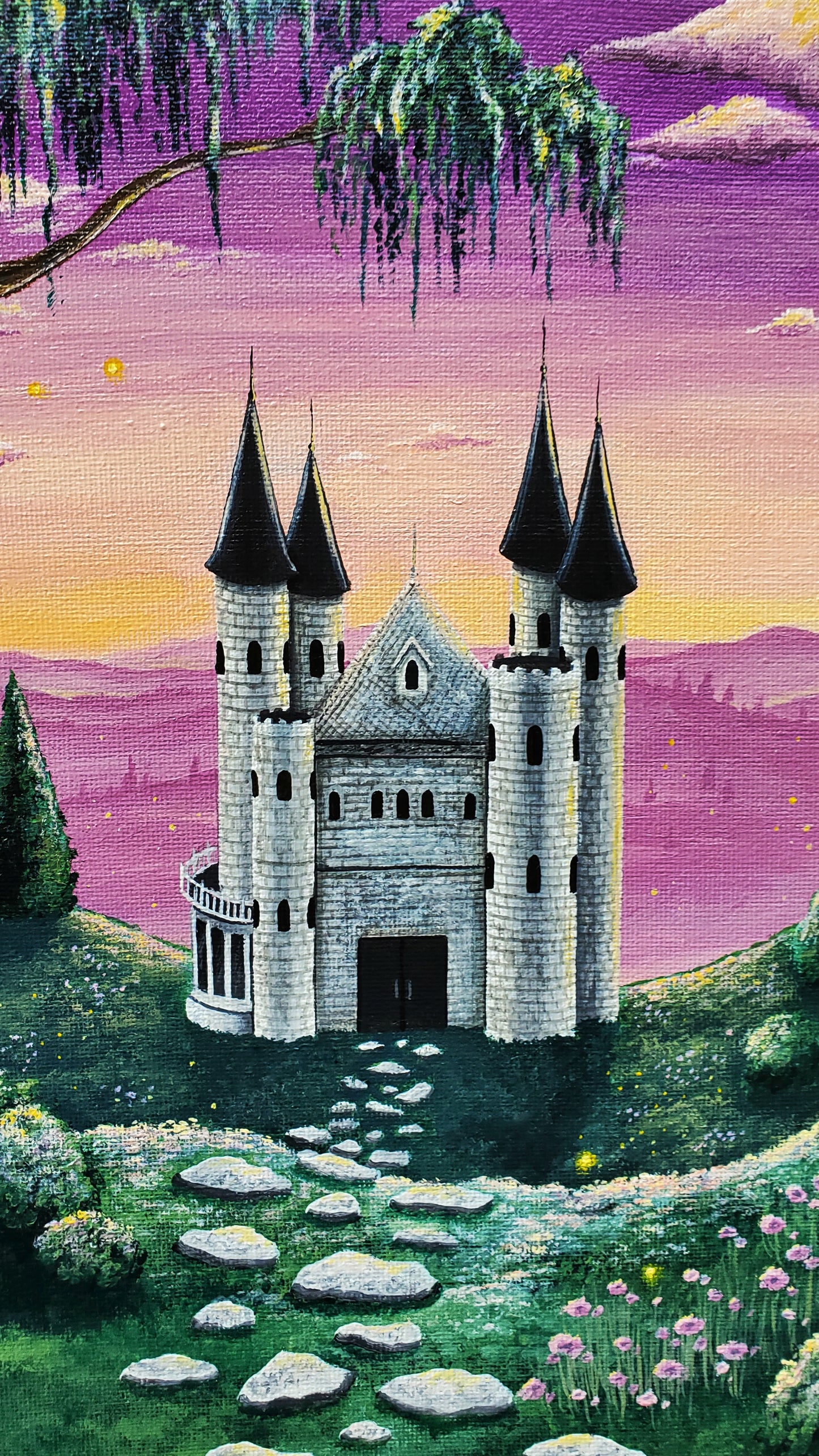 Castel close up. It has four roofed towers, with two classic castel towers up front. To the left is a balcony