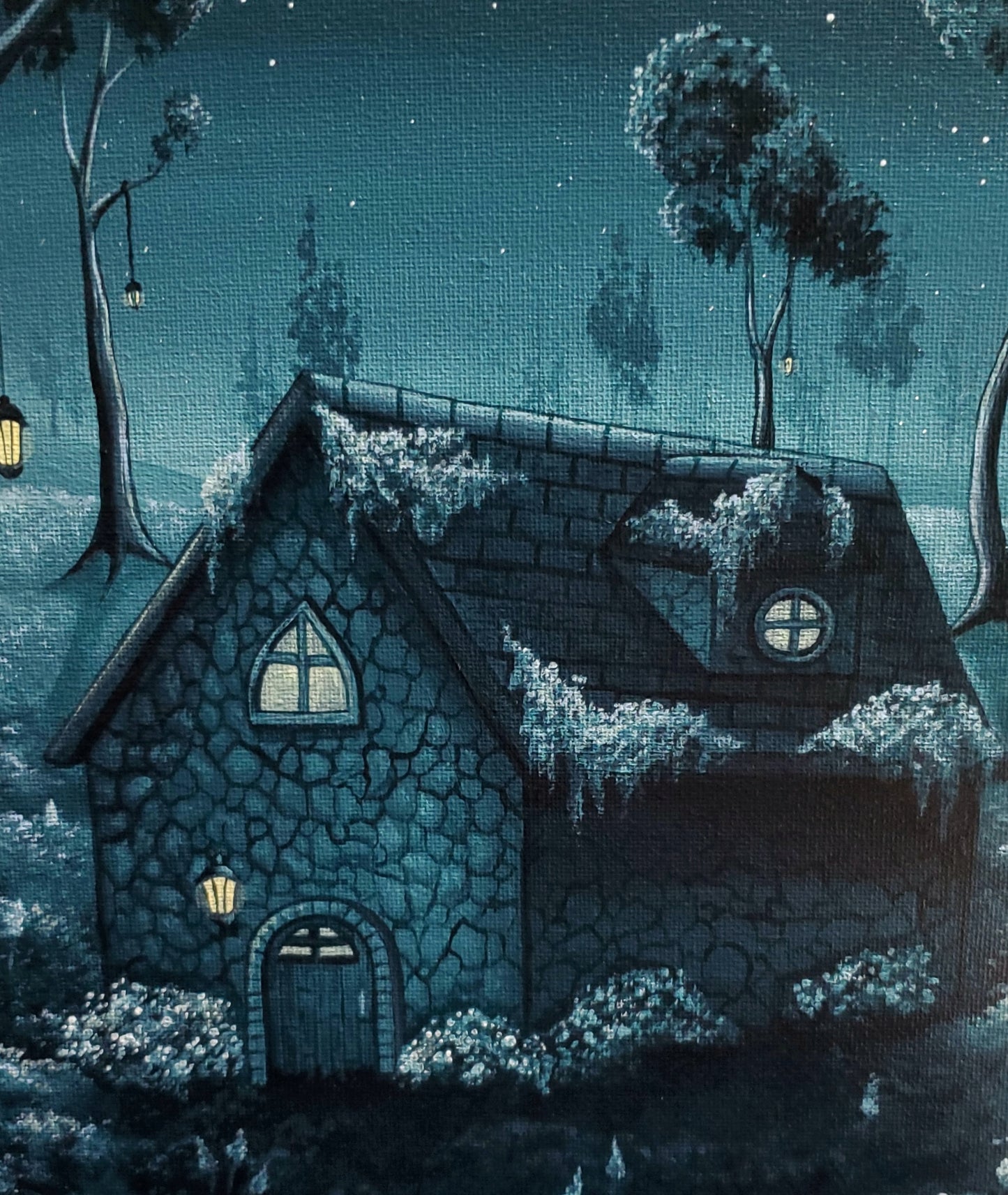 Close up of cottage home and lanterns hanging from the surrounding trees. Yellow has been worked into the highlights of the piece to tie in the yellow tinted lighting.