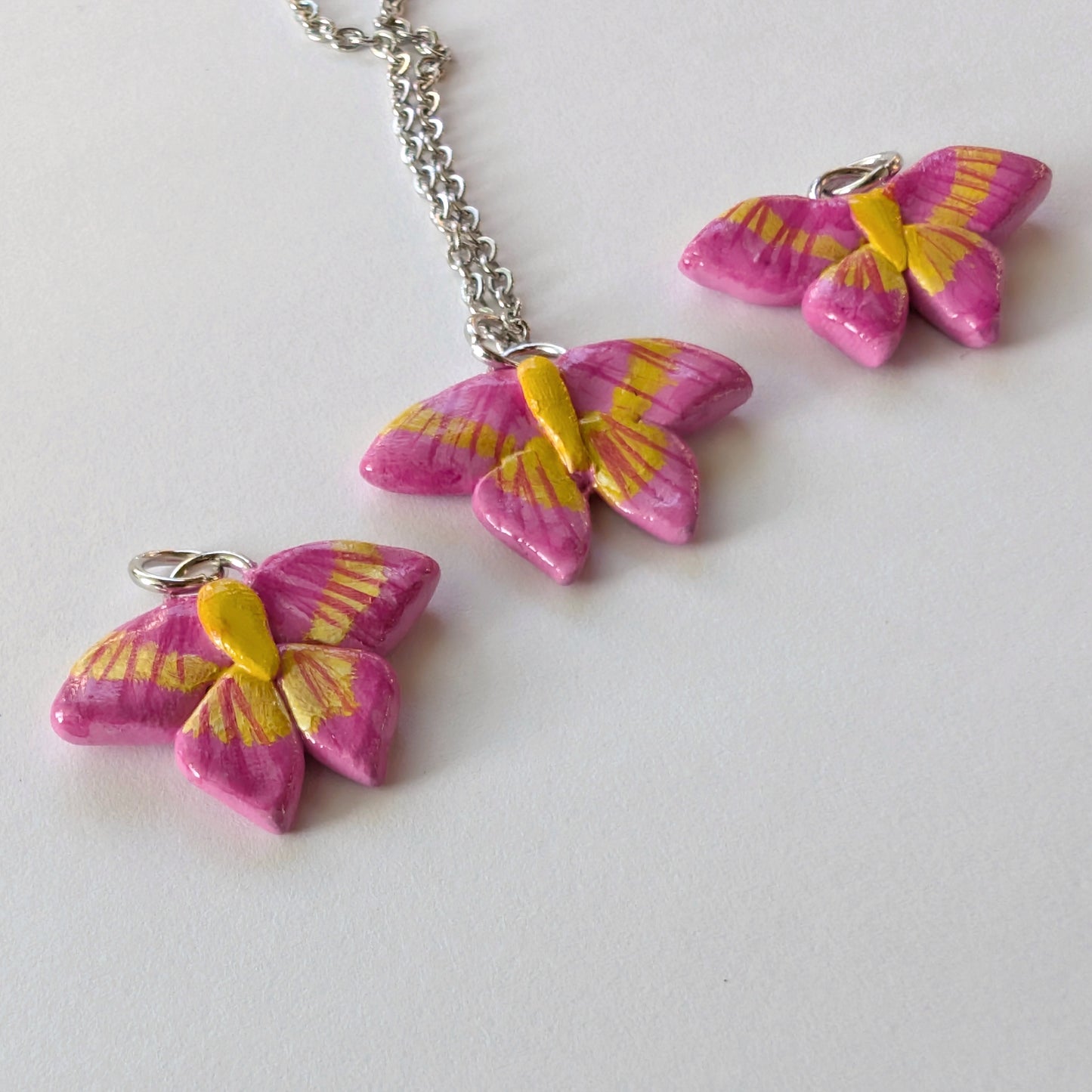 Rosy Maple Moth Necklaces